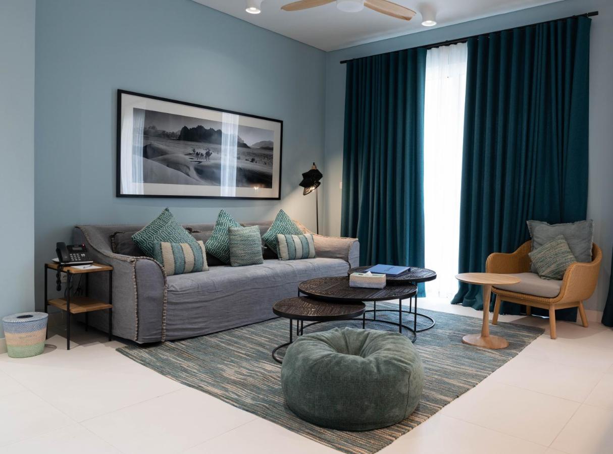 Cloud 7 Residences Ayla Aqaba Exterior foto A living room